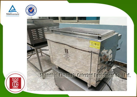 comprar O assado comercial de aço inoxidável elétrico grelha o tampo da mesa com armário Fabricação em linha